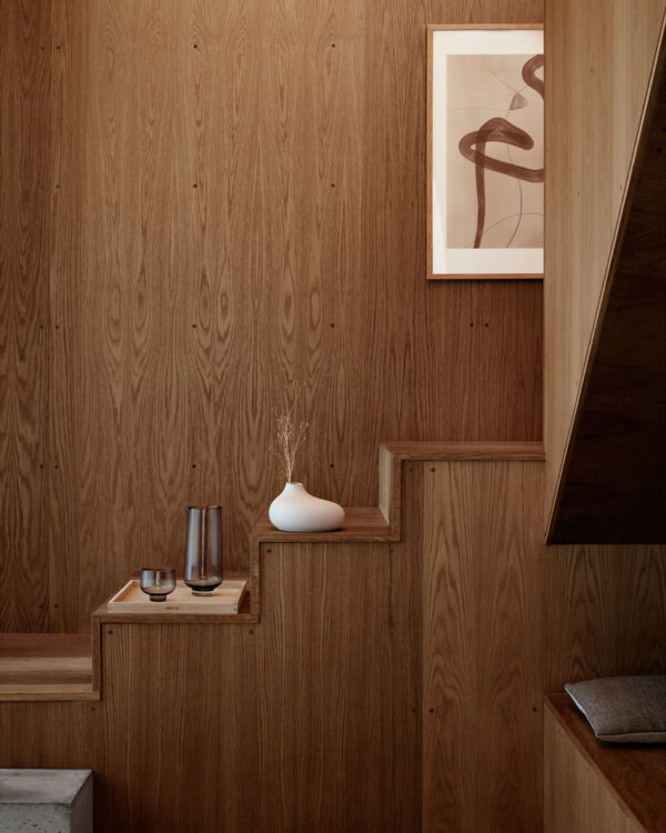 ceramic vase on a wooden stairs