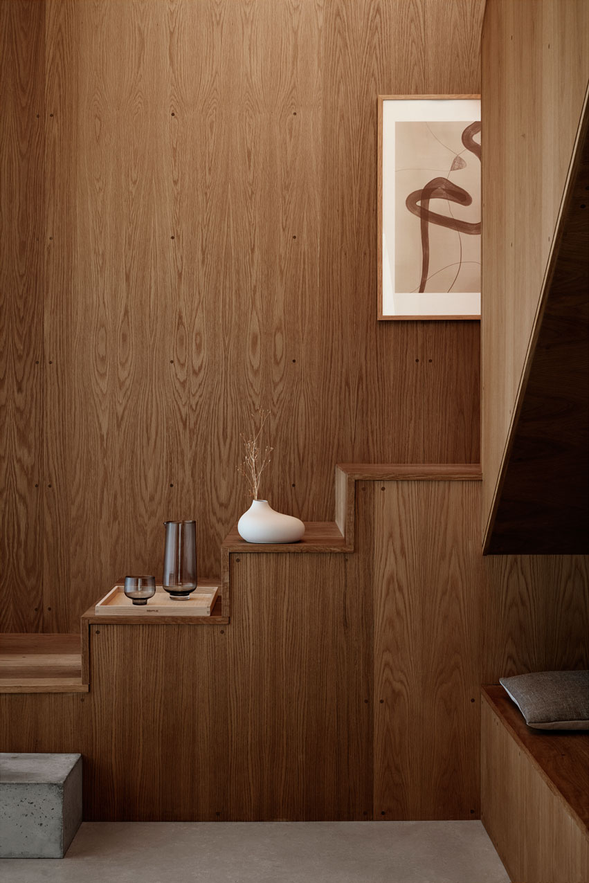 ceramic vase on a wooden stairs