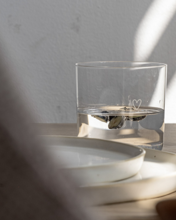 Modern Heart Print Glass Set | 350ml | Set of 2 | Stackable Design Transform your table setting with these elegant thin-walled drinking glasses. Each glass in this set of two features a delicate white heart print and unique owl base engraving. Despite their lightweight design, these 350ml glasses are surprisingly durable and conveniently stackable. Perfect for everything from water and cocktails to desserts and snacks. Dishwasher safe and sized just right at 8.5cm height, these versatile glasses blend modern style with everyday practicality.