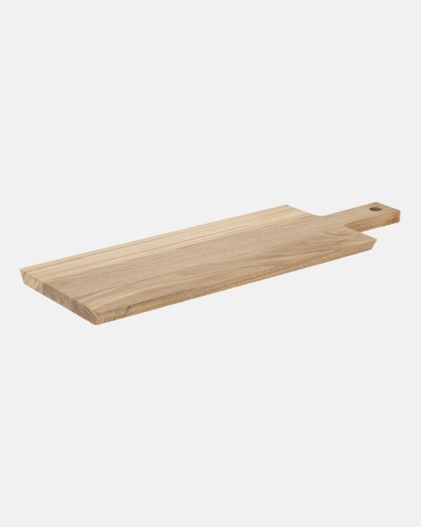 cutting board featured with other kitchen utensils in a kitchen setting