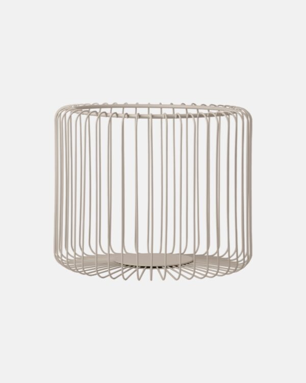 large wire basket in beige colour. basket for fruits and vegetables
