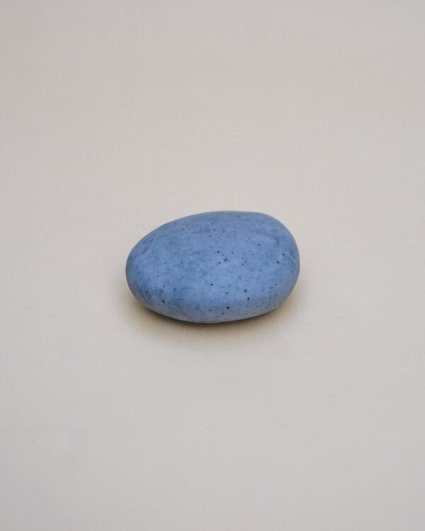 a grey soap that looks like a pebble