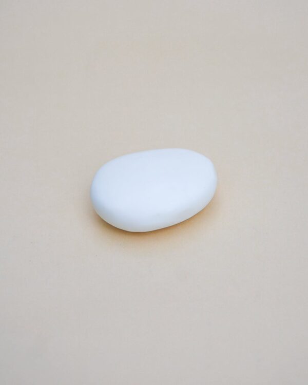 a grey soap that looks like a pebble