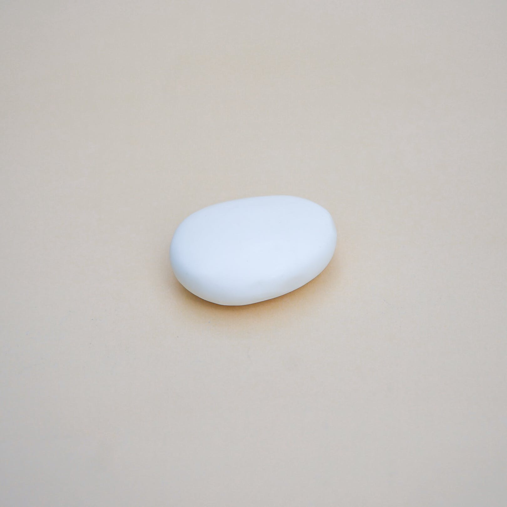 a grey soap that looks like a pebble
