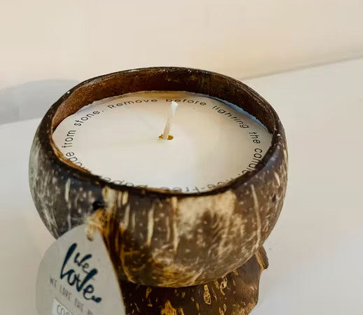coconut candle in a coconut base