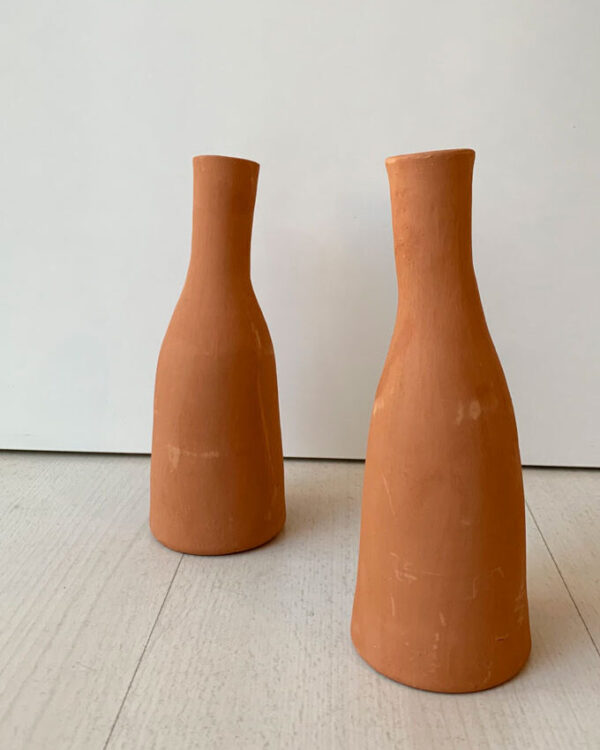 two shaped terracotta vases