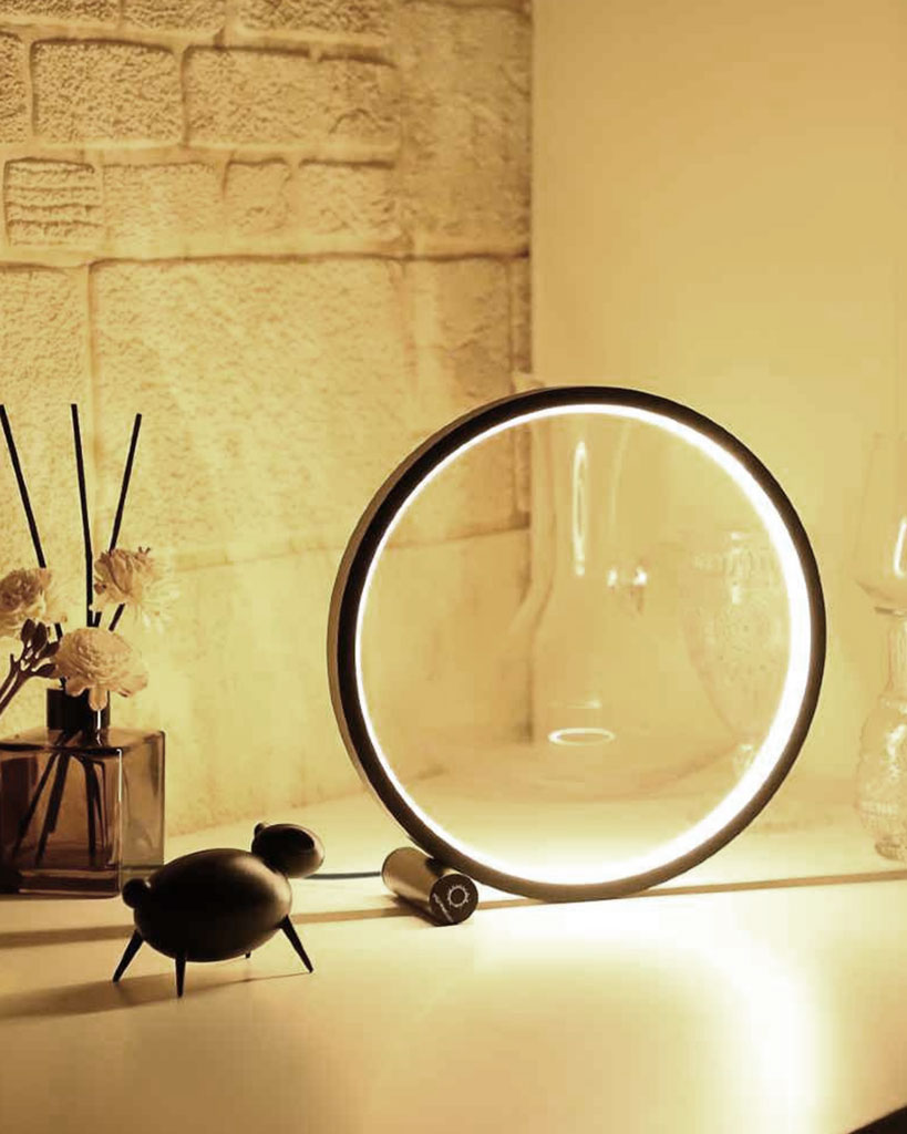 round table lamp which offers three dimmable brightness mode. touch activated