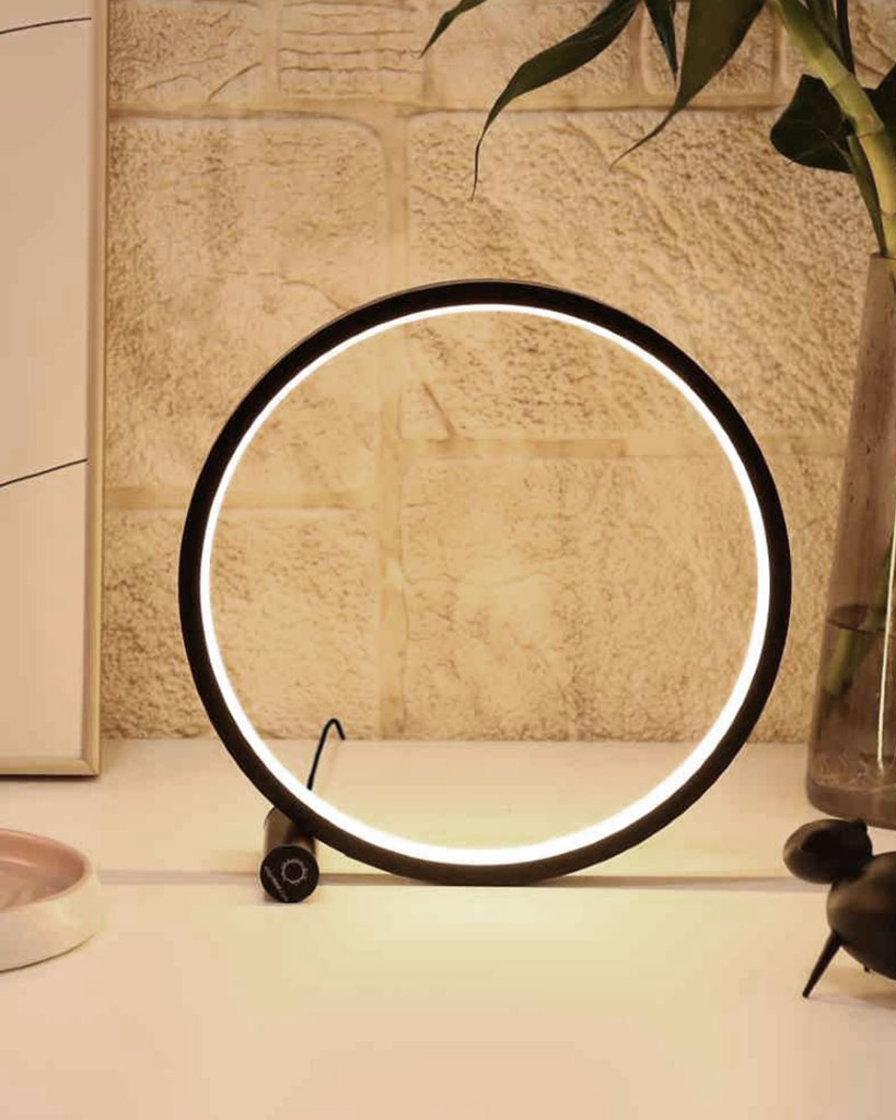 round table lamp which offers three dimmable brightness mode, touch activated