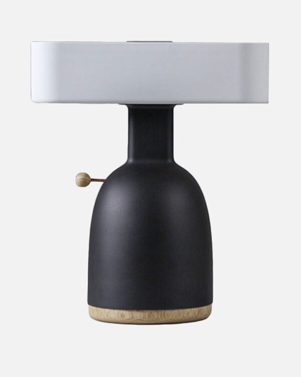 table lamp activated by inserting a coin