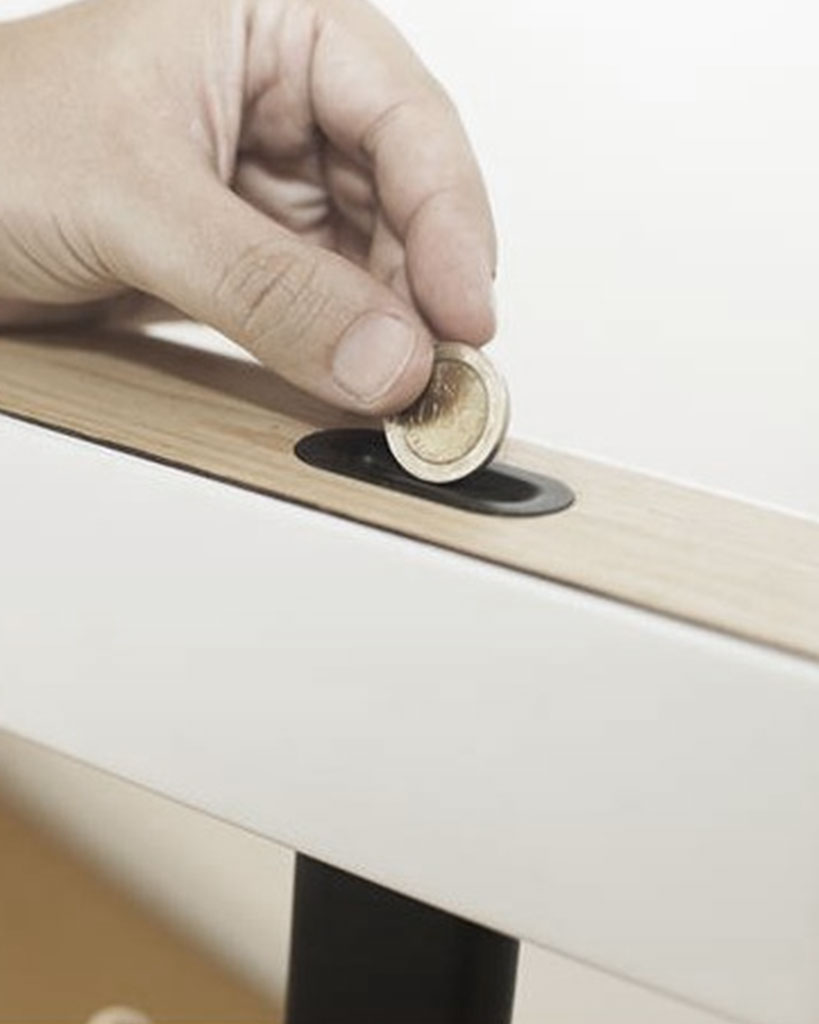 table lamp activated by inserting a coin