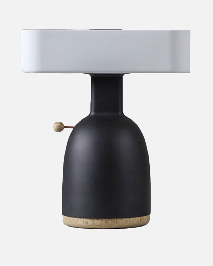 table lamp activated by inserting a coin