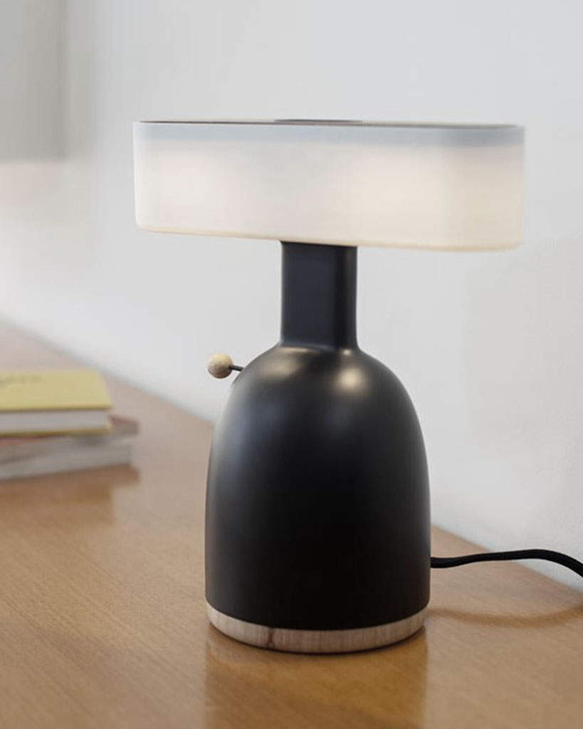 table lamp activated by inserting a coin