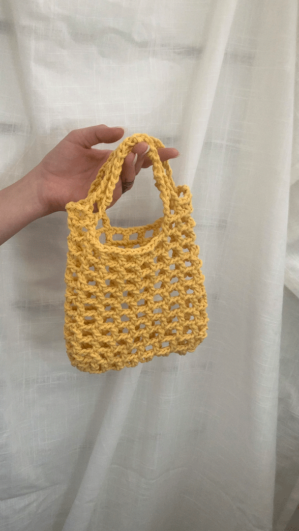 yellow crochet bag