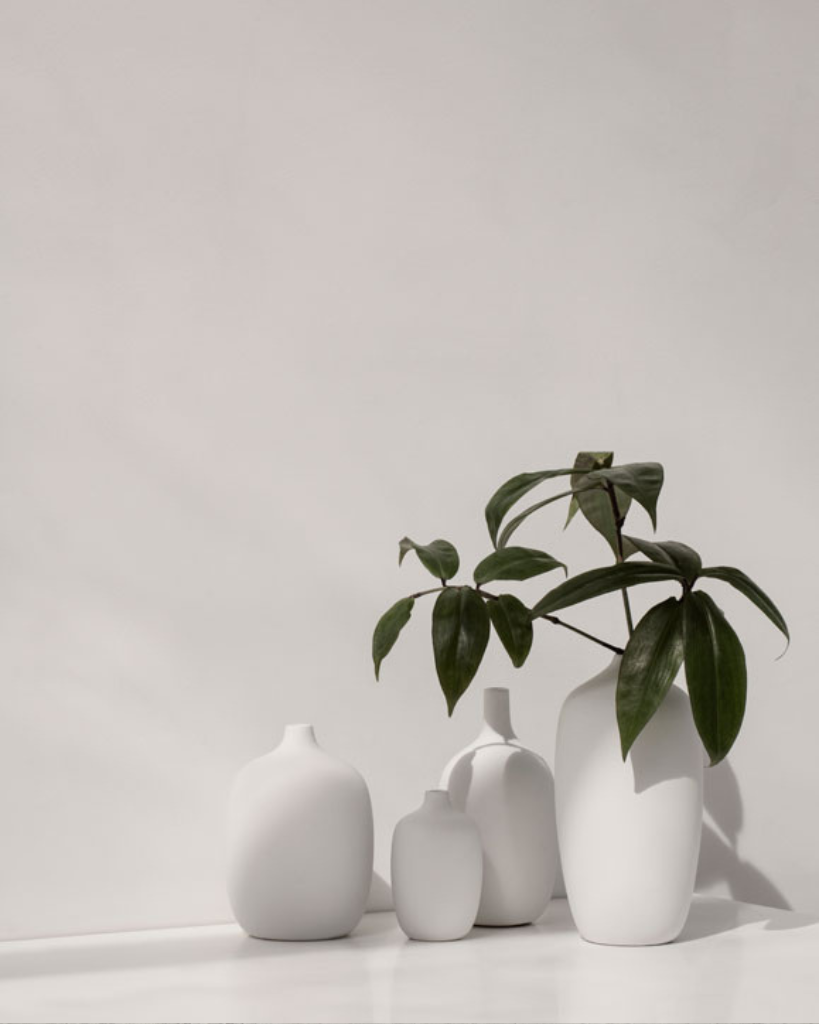 Discover the rustic beauty of the Ceola vase series by Frederike Martens. Handmade by local artisans, each vase in soft white brings a unique, natural feel to your interior.