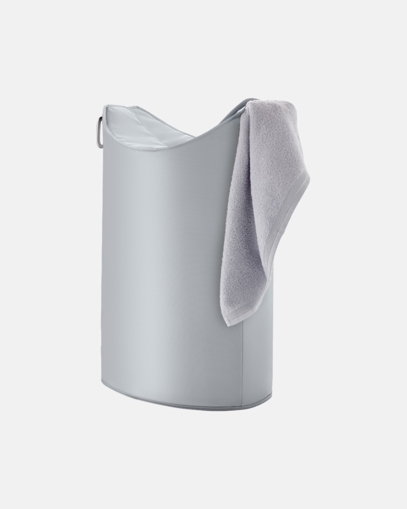 Meet the FRISCO laundry bin! This stylish, slimline design makes laundry day a breeze with its unique opening and easy-to-carry handles. Keep your space tidy!