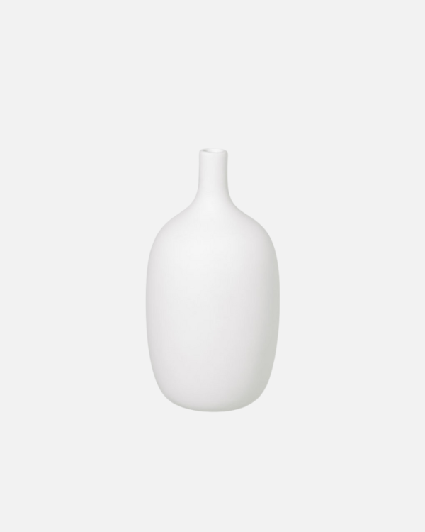 Discover the rustic beauty of the Ceola vase series by Frederike Martens. Handmade by local artisans, each vase in soft white brings a unique, natural feel to your interior.