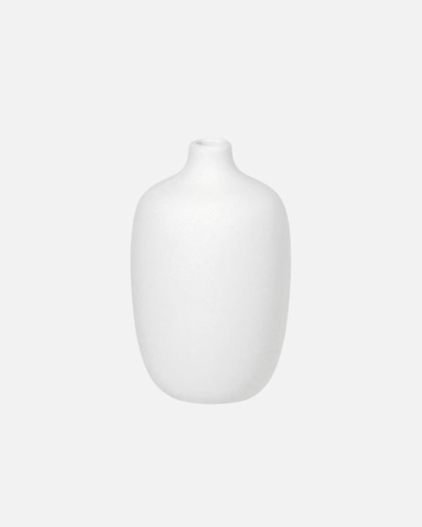 Discover the rustic beauty of the Ceola vase series by Frederike Martens. Handmade by local artisans, each vase in soft white brings a unique, natural feel to your interior.