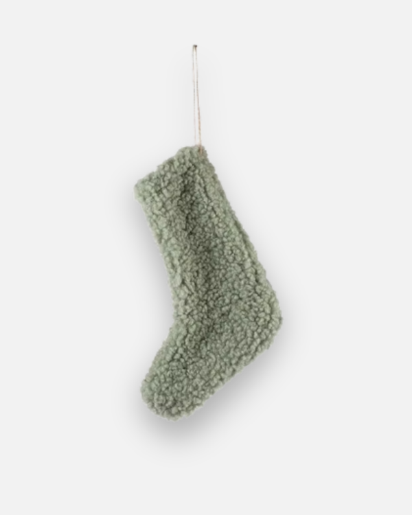 christmas stocking in a green colour