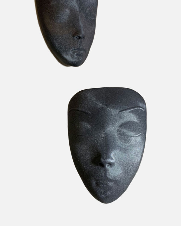 wall hanging pot with a shape of a face
