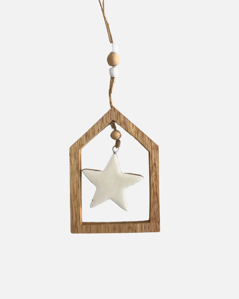 christmas house outlined ornament with a star shape in it with white ceramic coating