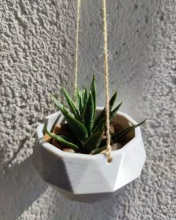 geometric hanging planter in a dark & light grey colour