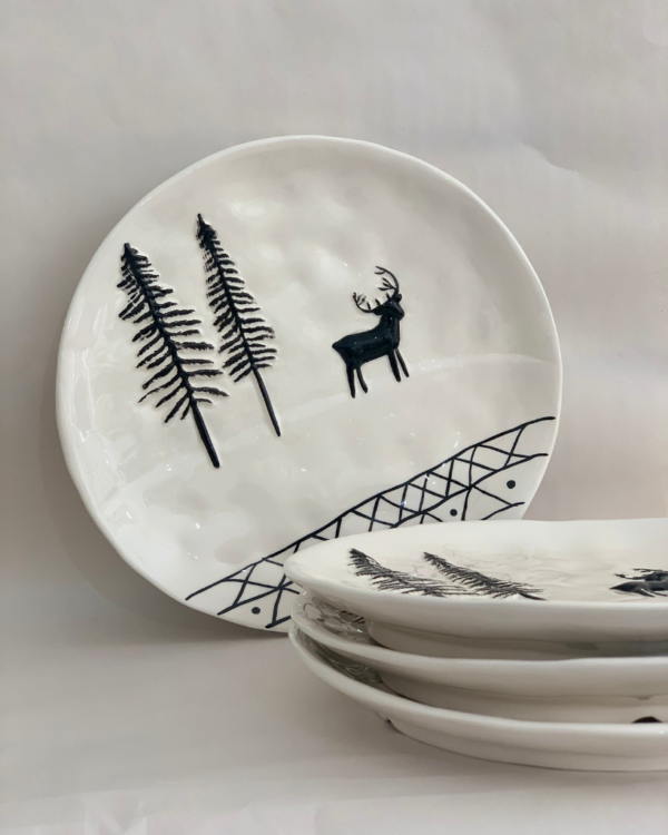 christmas plate with fir trees and a reindeer
