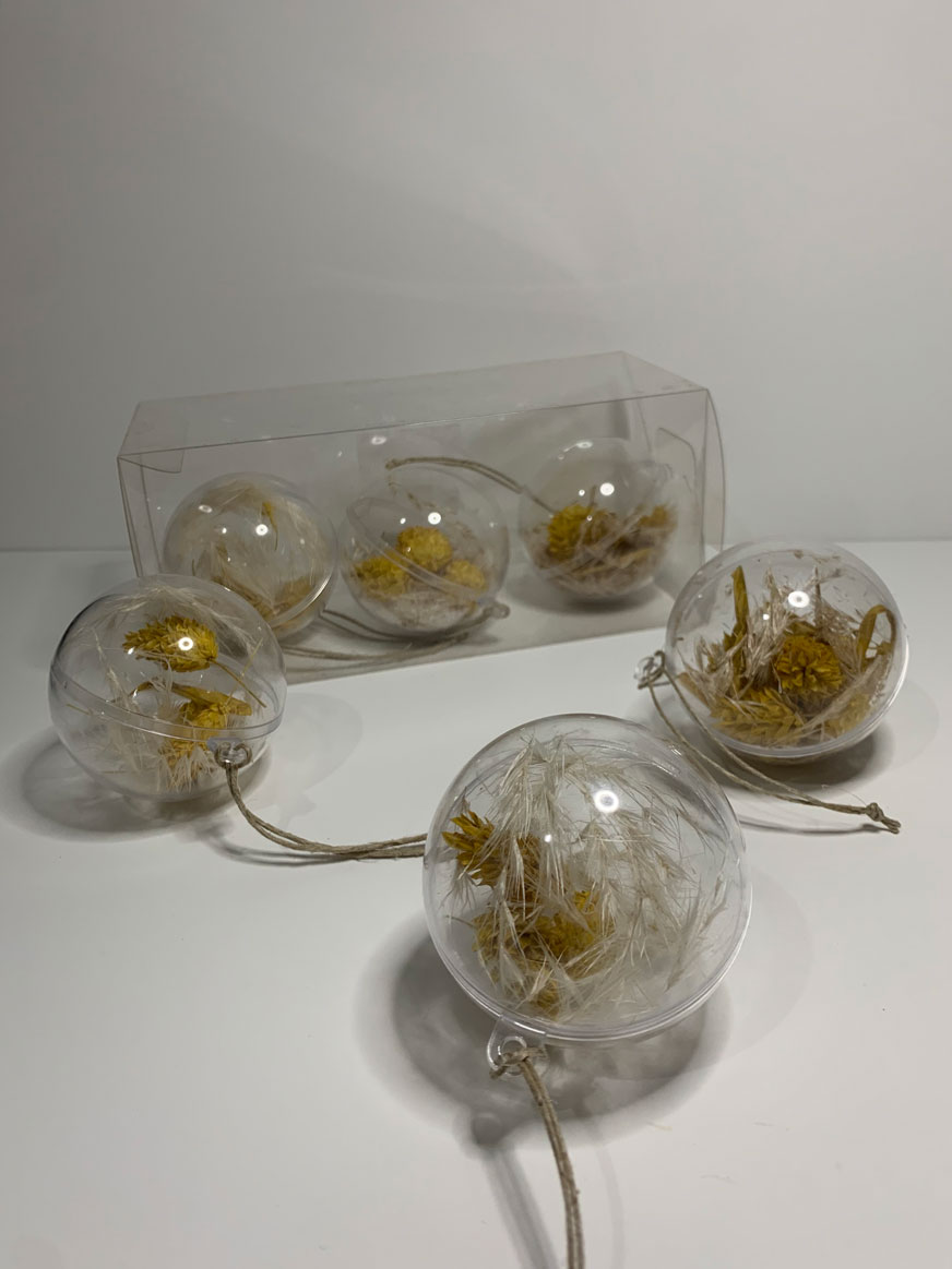 Set of 3 clear plastic baubles filled with dried pine branches and pampas grass, perfect for adding a rustic touch to holiday decorations.