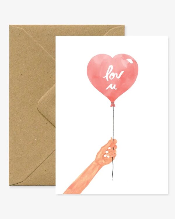 an A6 card with a hand holding balloon in the shape of a heart with lov u written on it