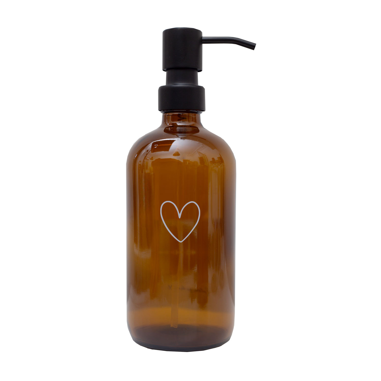 amber glass soap dispenser with an outline of a white heart engraved