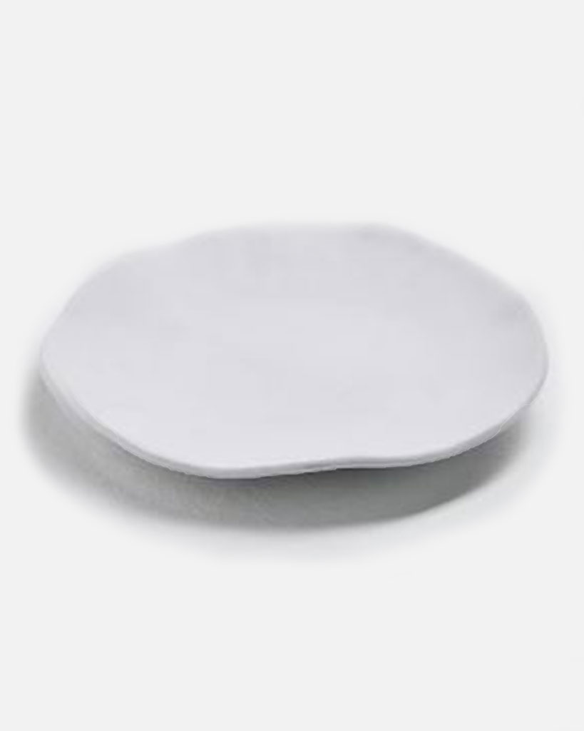 white organic shape salad plate. Unique modern shape and a matte glaze finish.