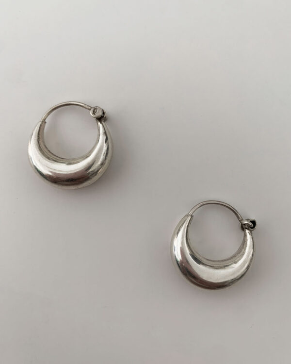 sterling silver hoop earrings on a white background