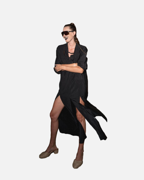 Black kimono dress with high slits and pockets at the front. Comfortable fit that can be worn as casual wear or for a formal event.