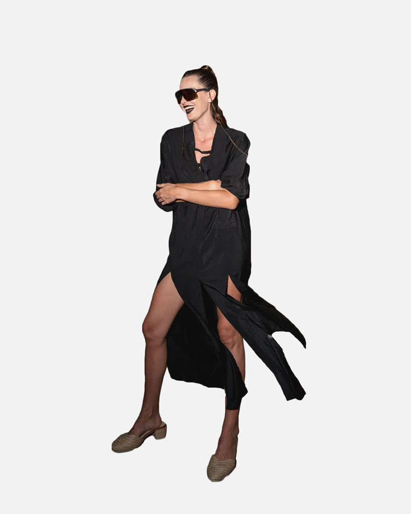 Black kimono dress with high slits and pockets at the front. Comfortable fit that can be worn as casual wear or for a formal event.