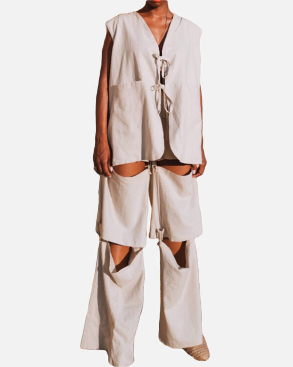 a linen waistcoat with side splits and hidden pockets that can be tied at the front for extra comfort and practicality. Double-sided for a clean finish! Made with 100% linen fabric. with Linen trousers with three+ ways to wear. 1. Long wide-leg trousers 2. Culotte trousers 3. Shorts Adjustable elastic waist.