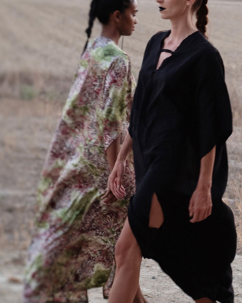Printed satin kimono dress alongside a black kimono with high slits and pockets at the front. Comfortable fit that can be worn as casual wear or for a formal event.