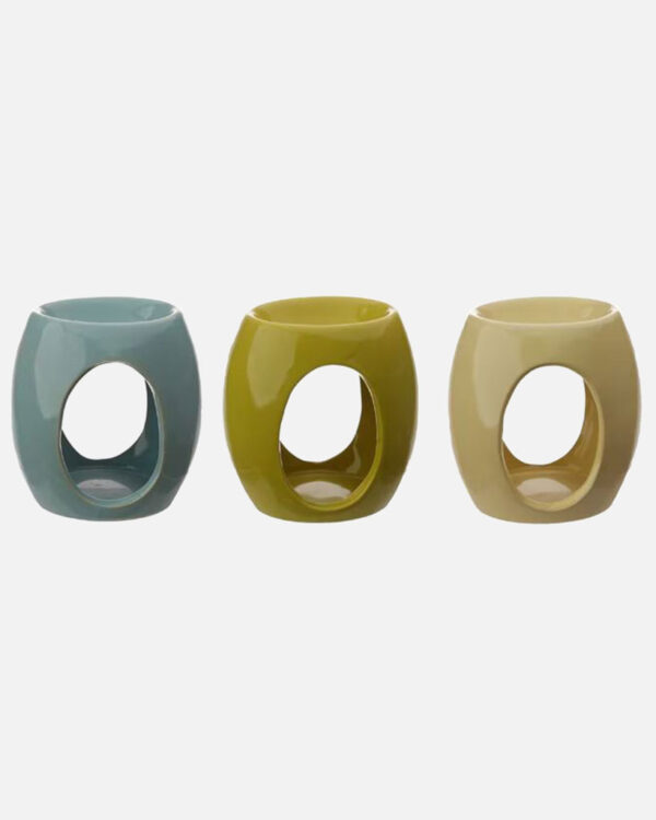 Ceramic Oil Burner with Oval Cut-out in three colours ( turquoise, and 2 shades of yellow) Crafted with care to create a soothing and inviting atmosphere.