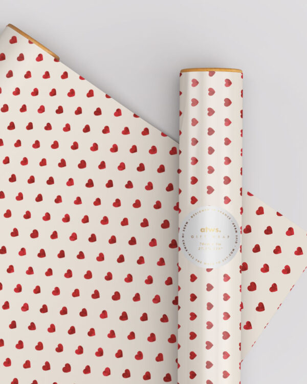 wrapping paper, with a pattern of red hearts