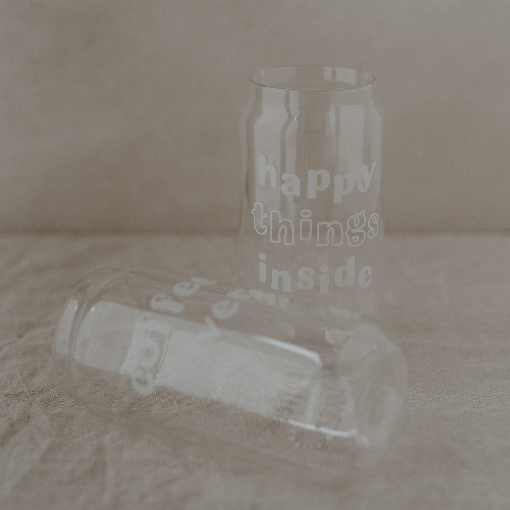 Elevate your drinkware collection with our new glasses. Standing at approximately 15 cm tall and 7.5 cm wide, these sleek white glasses feature a unique print inside. With a diameter opening of around 6 cm and a capacity of approximately 500 ml, they are perfect for serving generous portions of your favorite beverages. Crafted from high-quality glass, they are both stylish and durable, sure to impress your guests.