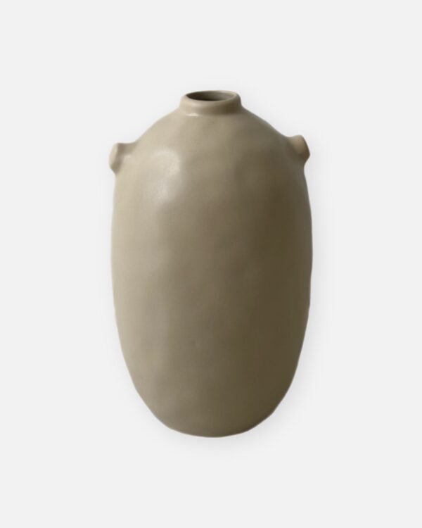muted tones of beige vase. boho decor. minimalistic or rustic.