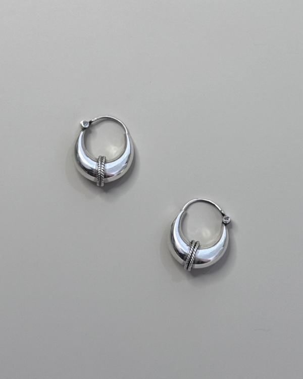 sterling silver hoop earrings on a white background