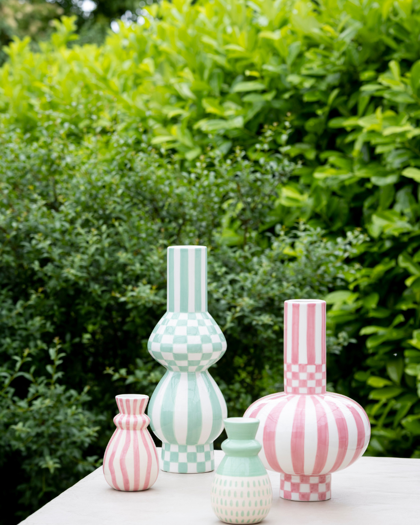 Discover the ceramic Gabriel vase from Qué Rico - a vibrant addition to your home decor. Hand-painted with a Squares & Stripes pattern, this Belgian-designed vase is a unique and colourful gift option.