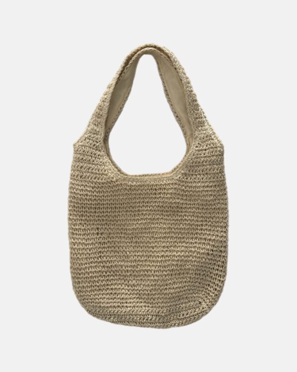 This raffia tote bag is the perfect accessory for your summer adventures. Made from natural raffia fibres, this tote is not only eco-friendly but also durable enough to carry all your essentials.