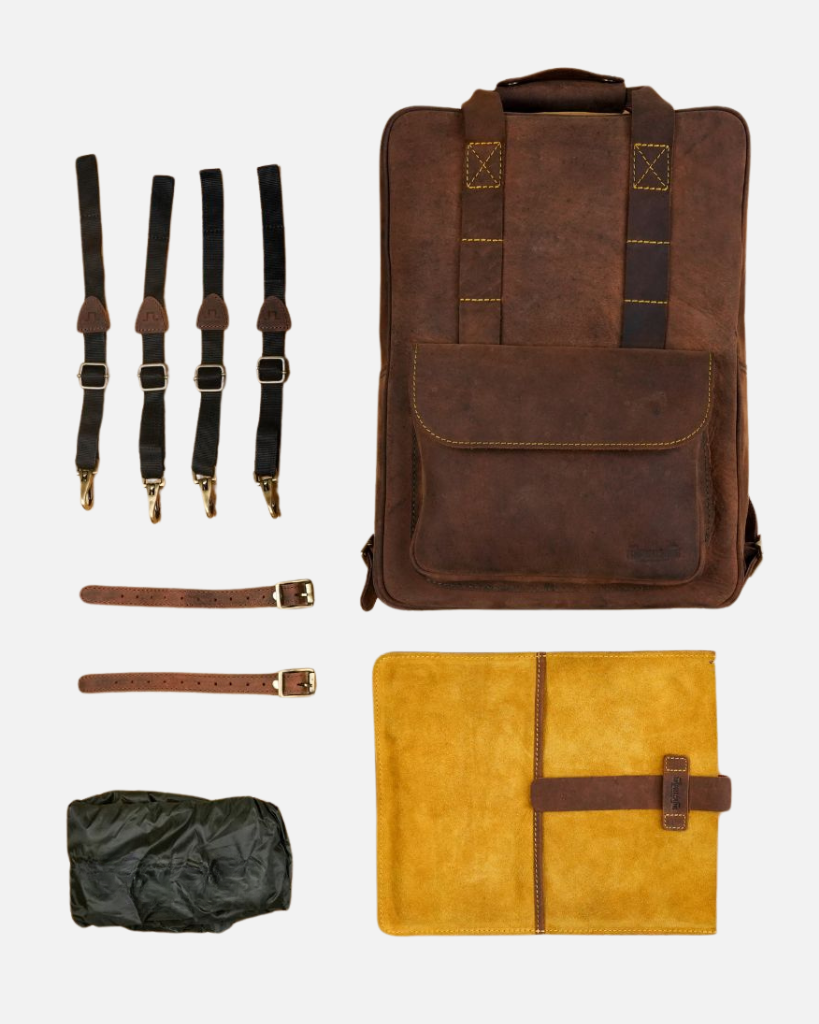 eastwood | backpack use it as a saddlebag or tail bag 2.2 mm thick heavy duty leather that's forged to last hard waxed leather that builds its own patina over time detachable suede laptop sleeve and 2 internal bottle holders quick access rain cover