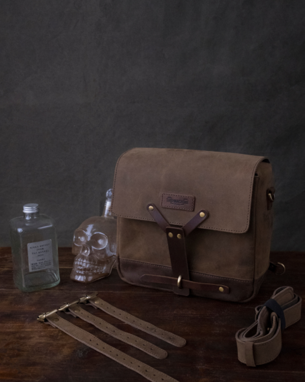 Inspired by WWII Swiss ammunition bags, this handcrafted leather messenger bag combines timeless military design with modern functionality. Durable and versatile, it features ample storage for daily essentials, including an iPad, and can even be mounted on motorcycles. Perfect for commuters, heritage style enthusiasts, and anyone who appreciates quality leather goods.
