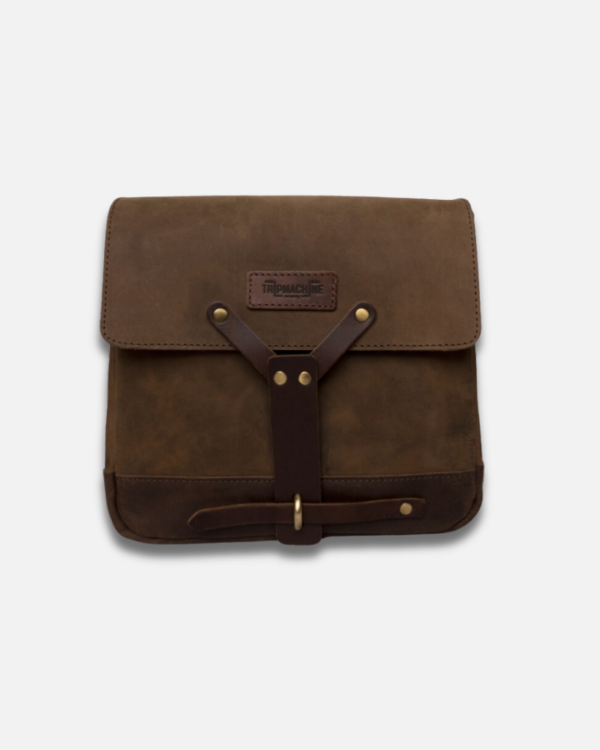 Inspired by WWII Swiss ammunition bags, this handcrafted leather messenger bag combines timeless military design with modern functionality. Durable and versatile, it features ample storage for daily essentials, including an iPad, and can even be mounted on motorcycles. Perfect for commuters, heritage style enthusiasts, and anyone who appreciates quality leather goods.