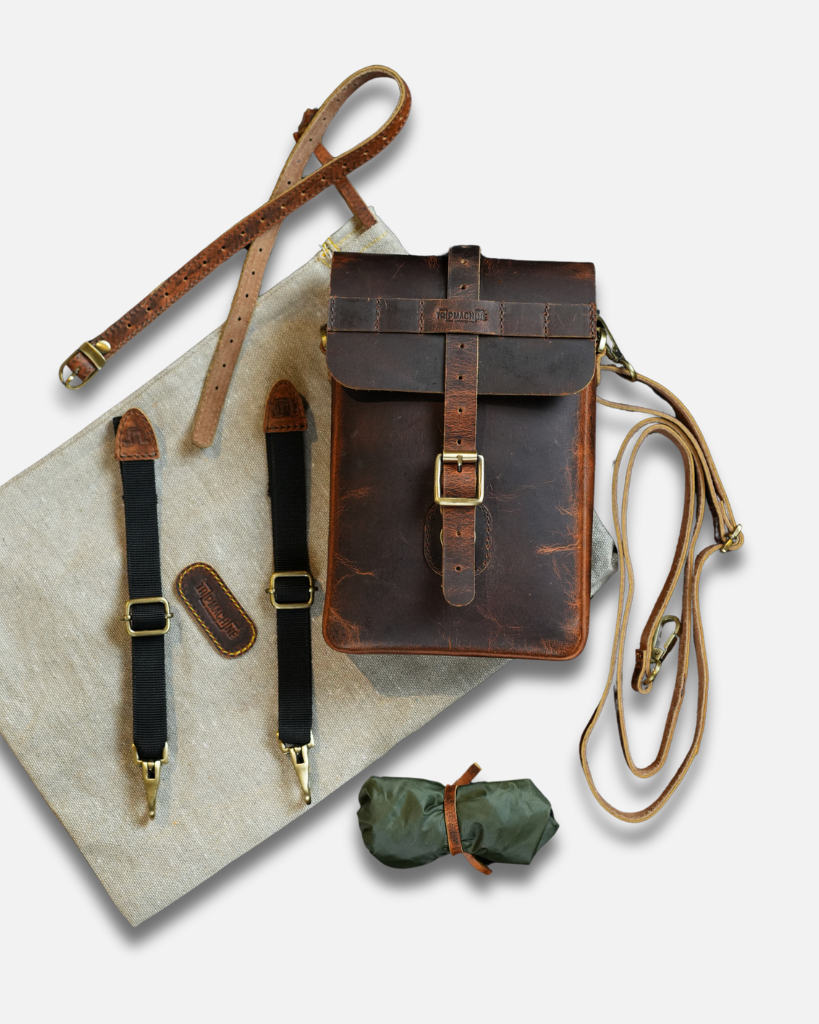 Premium leather sling bag with quick-release mounting (motorcycle compatible), one-click opening, and included rain cover. Handcrafted and built to last, developing a unique patina over time. Perfect for everyday carry and more.