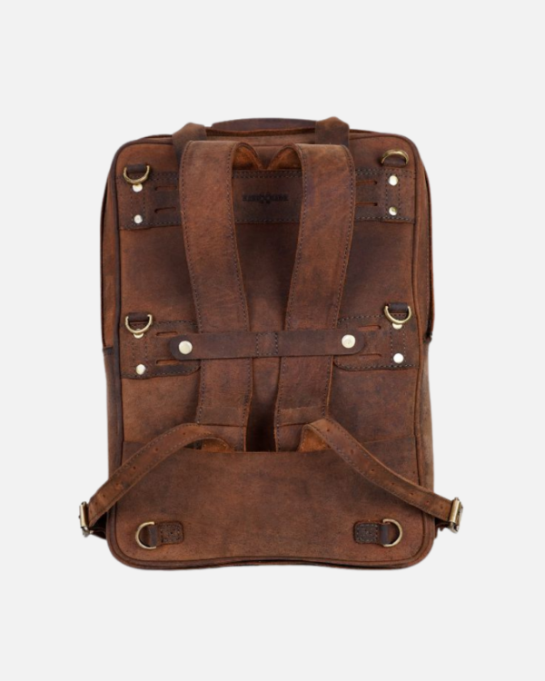 eastwood | backpack use it as a saddlebag or tail bag 2.2 mm thick heavy duty leather that's forged to last hard waxed leather that builds its own patina over time detachable suede laptop sleeve and 2 internal bottle holders quick access rain cover