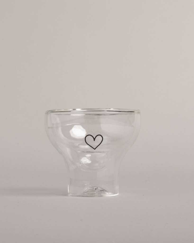Serve in style with our double-walled heart glass. This elegant 100ml glass features temperature-maintaining design, perfect for cocktails and desserts. Dishwasher safe and heat-resistant for versatile entertaining.
