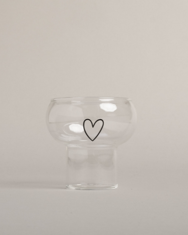 Make every drink special with the trendy Bubble Glass Heart. This unique glass features a playful spherical shape and charming heart detail, perfect for cocktails, iced coffee, or any beverage. Stylish, functional, and dishwasher safe.
