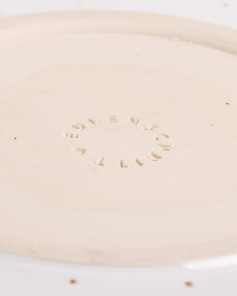 Elevate your dining experience with our handcrafted Calma dinner plate. Each 27cm plate features natural glaze variations and improved stackable design. Perfectly sized for main courses, this dishwasher-safe plate combines artisanal beauty with modern practicality.